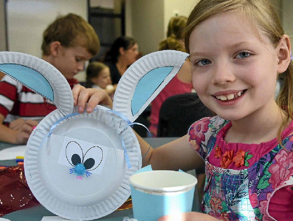 Phoebe Thumpkin showed off the Easter Bunny she made during craft activities at the Warwick Library on Wednesday. Phoebe Thumpkin showed off the Easter Bunny she made during craft activities at the Warwick Library on Wednesday.